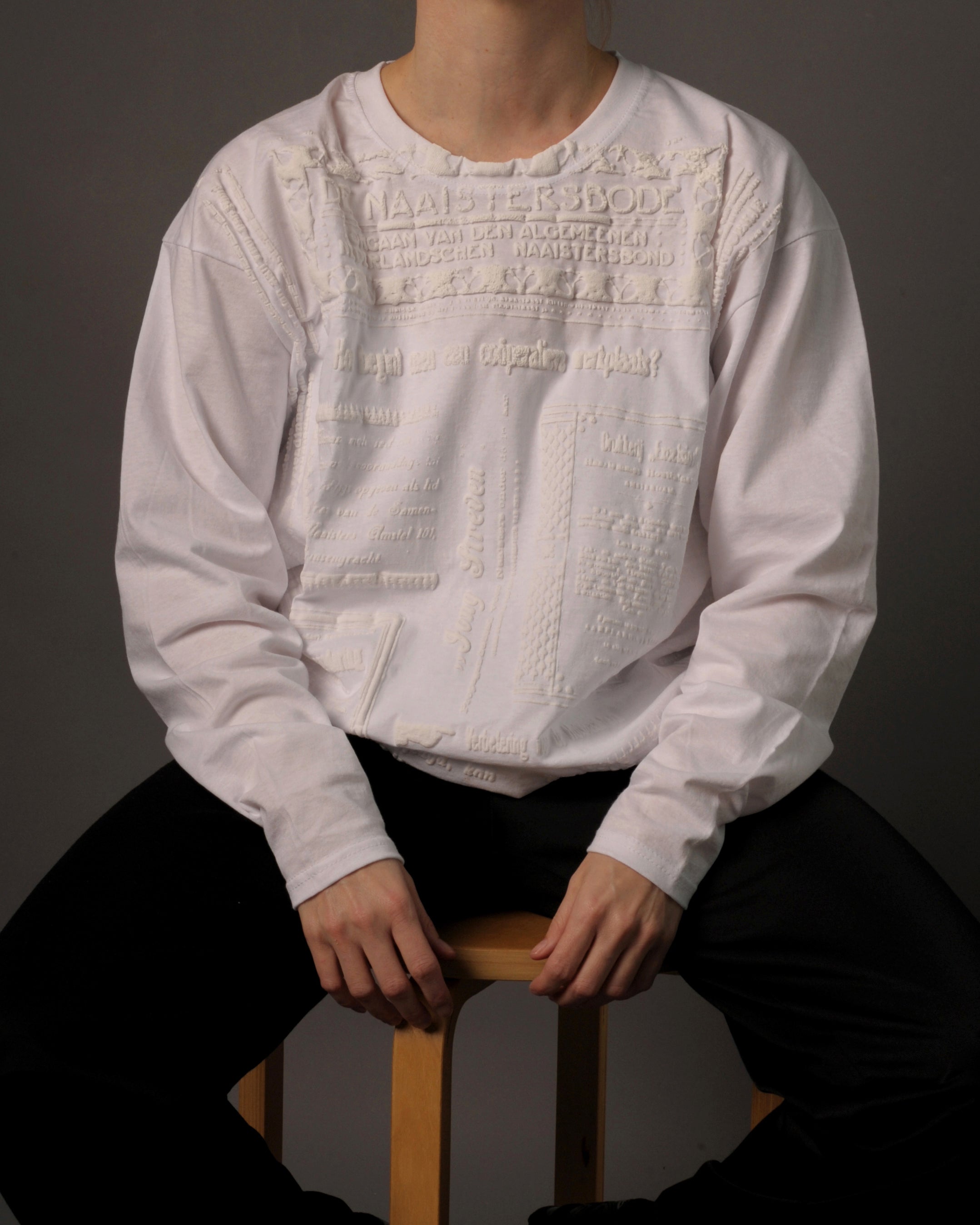 All Work Is Women's Work white puffy assemblage longsleeve